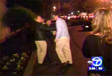 Kensinger and Pesavento (left) during an attack caught on camera by WJLA