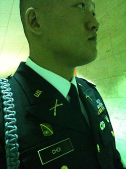 Former Lt. Dan Choi waits for his case to be called in the hallway outside a courtroom at D.C. Superior Court on July 14.