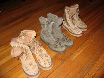 Boots signed by former servicemembers impacted by the “Don’t Ask, Don’t Tell” policy were left at the office of Sen. Jim Webb (D-Va.) by members of Get Equal on Friday, September 17.