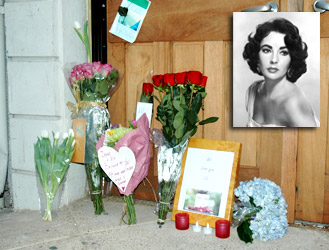 Flowers left for Taylor in front of the Elizabeth Taylor Center