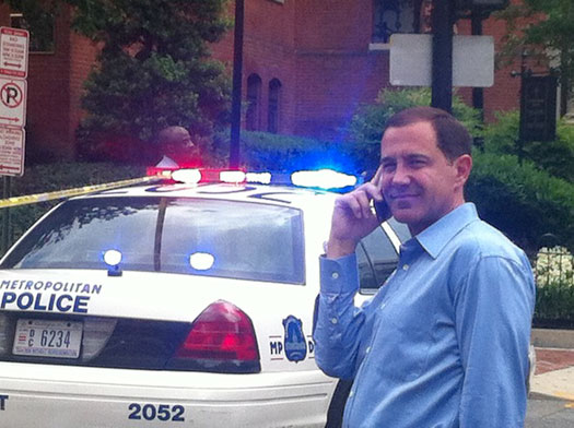 HRC President Joe Solmonese waits as police inspect HRC headquarters