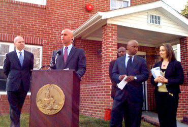 Mayor Adrian M. Fenty speaks in front of the Wanda Alston House