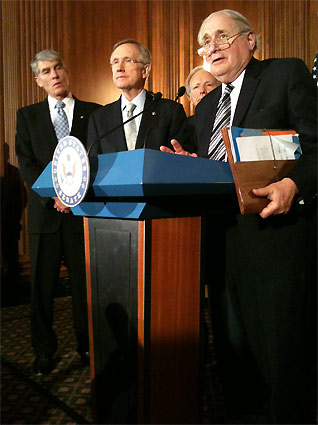 Sen. Carl Levin (D-Mich.) speaks to reporters after the successful cloture vote signaled the end to ''Don't Ask, Don't Tell'' on Dec. 18, 2010. Behind him are, from left, Sens. Mark Udall (D-Colo.), Harry Reid (D-Nev.) and Joseph Lieberman (I-Conn.)