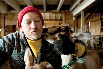 Farmer John with Goats