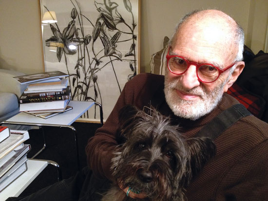 Larry Kramer, with his dog Charley, in his Manhattan home
