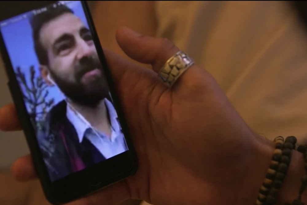 Ahmed and Josepg use Skype to see one another, Credit: BBC News