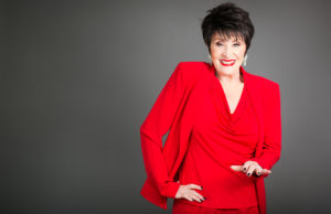 Chita Rivera in red