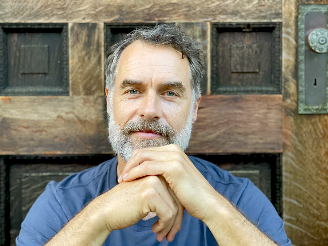 White Lotus star Murray Bartlett talks artful intimacy, Jennifer Coolidge, and the importance of queer casting