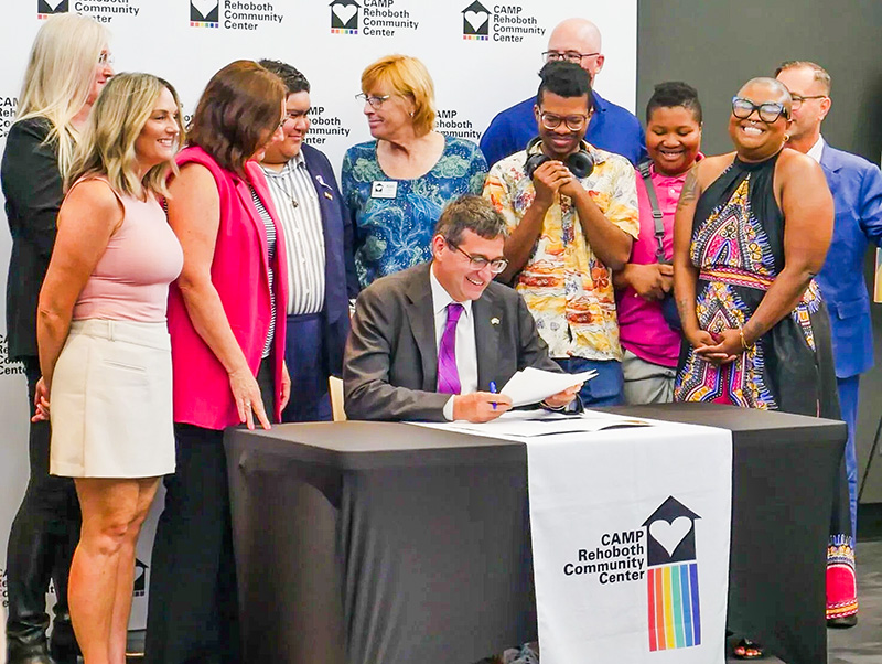 Governor Matt Meyer signs an executive order on June 20, 2025 that adds further protections for gender-affirming care providers and patients. Photo: Office of the Governor