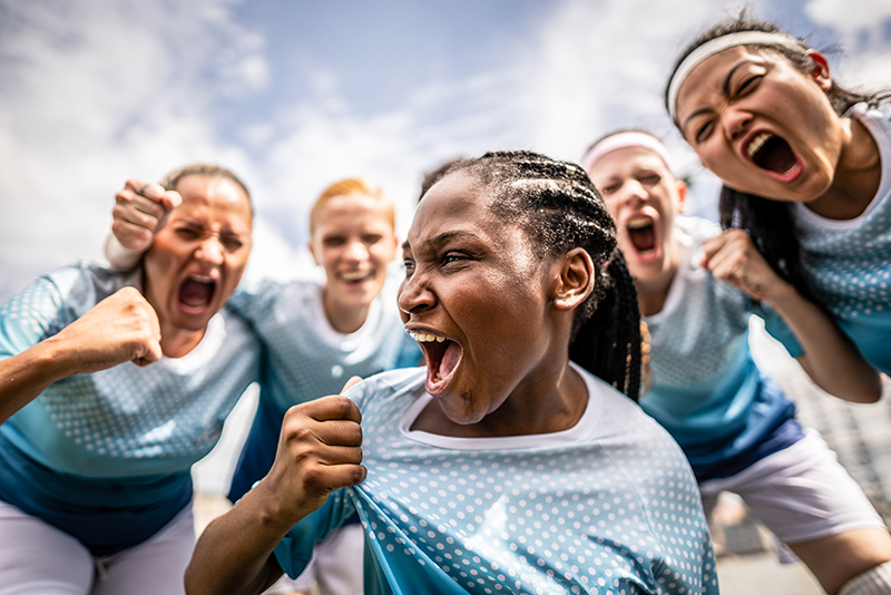 Portrait of a Female Soccer Team Celebrating